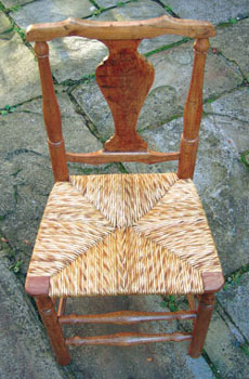 A chair
Sue has repaired and reseated with English rush.